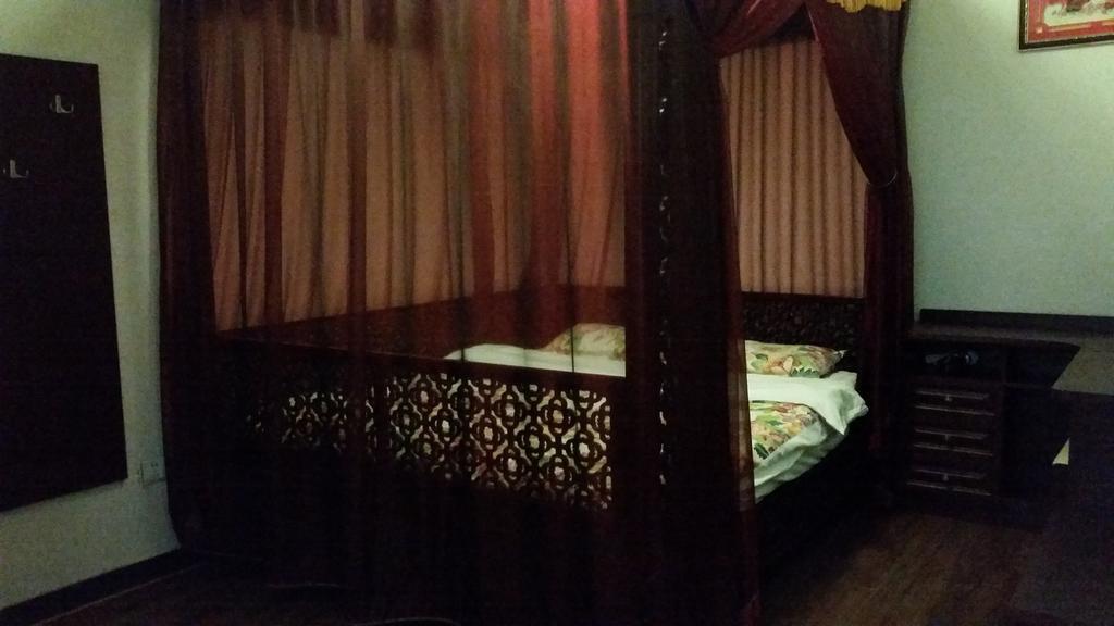 Tiananmen Best Year Courtyard Hotel Peking Zimmer foto